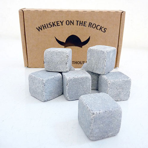 Whiskey on the Rocks -     *       Image 1     *       Image 2   When stored in the freezer, these soapstone cubes keep your beverages cold just like ice, but since they don't melt, they will never dilute your drink. Can also be heated in the oven to keep hot beverages warm.  One box of six whiskey rocks.   .75" square.   Made in Sweden.